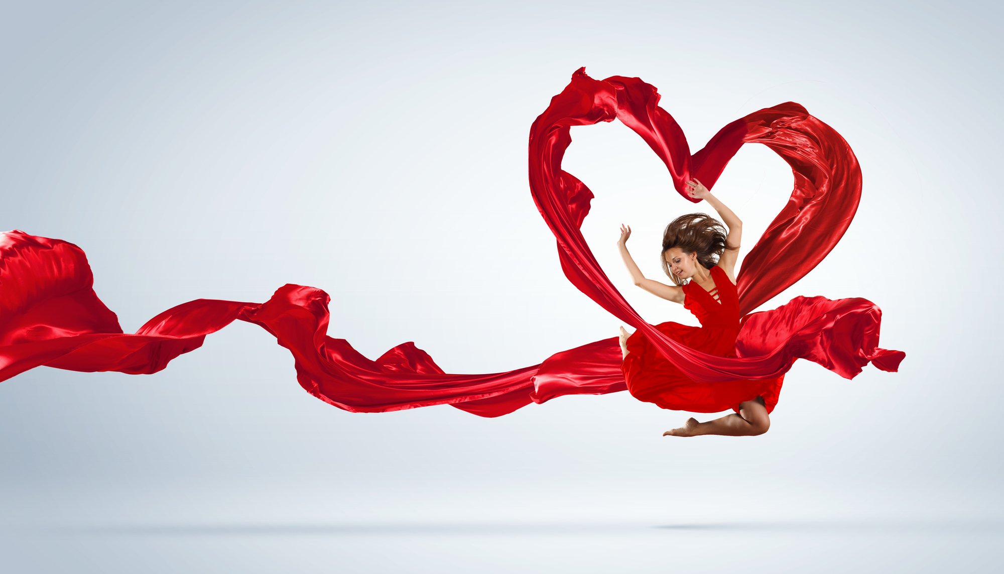 heart health dancing woman red scarf