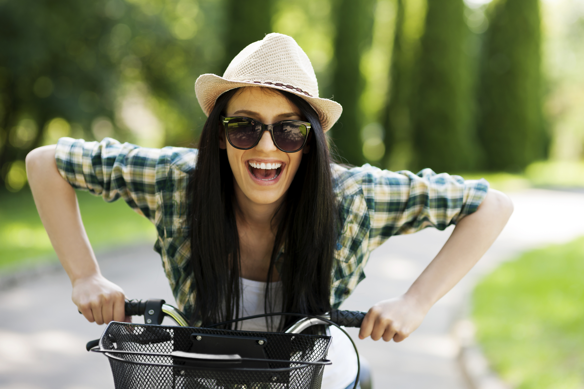 woman happy on bike energy smiling